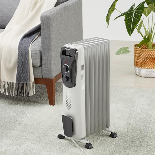 Amazon Basics Portable Oil Radiator Heater, Indoor Use, 3 Heat Settings, Over-Heat Protection, ETL-certified Safety, 7 Oil-Filled Steel Fins, 1500W, Tip-Over Protection, 11"D x 14.8"W x 25.2"H, White